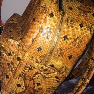 MCM Tan and Black Patterned Backpack